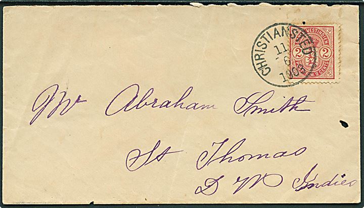 2 cents Våben single på brev fra Christiansted d. 11.6.1903 til St. Thomas. Trope-hul tæt på mærket.