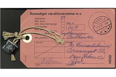 Beskadiget værdiforsendelse fra Århus d. 13.3.1991 vedrørende beskadigt brev.