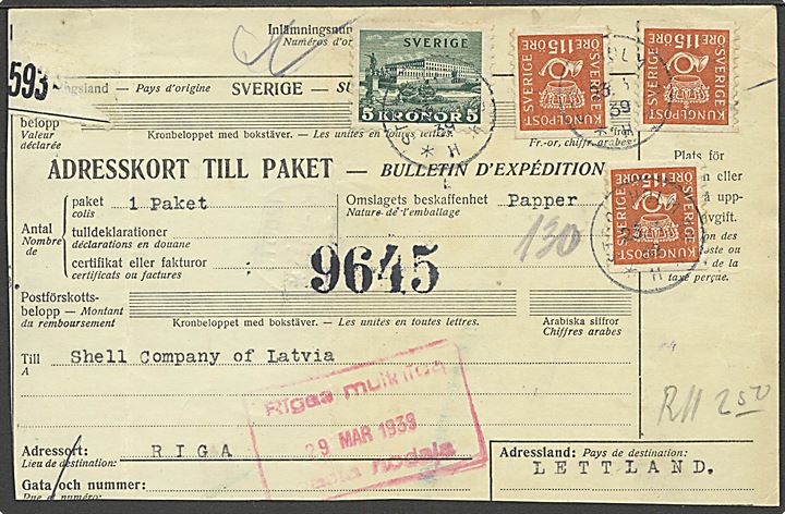 115 öre Tre Kroner (3) og 5 kr. Stockholm Slot på adressekort for pakke fra Stockholm d. 23.3.1939 til Riga, Letland. Beklippet. Usædvanlig destination.