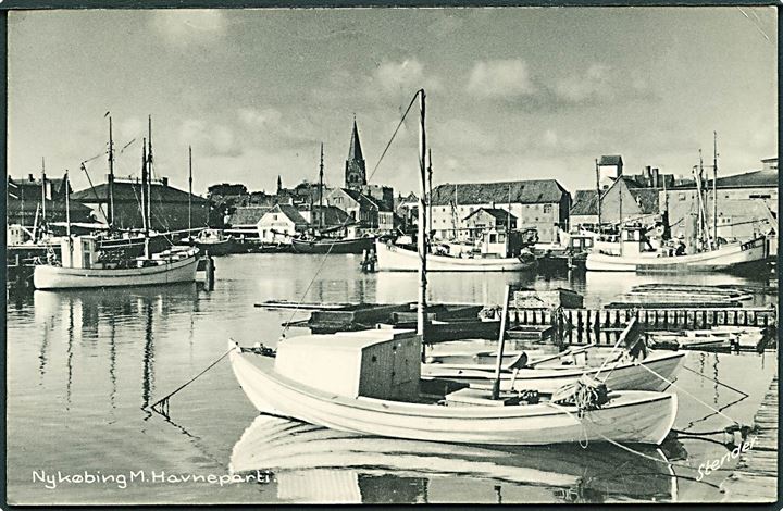 Havneparti fra Nykøbing M med både og fiskekutterne A 619 og A 309. Stenders, Nykøbing M no. 113 K. 