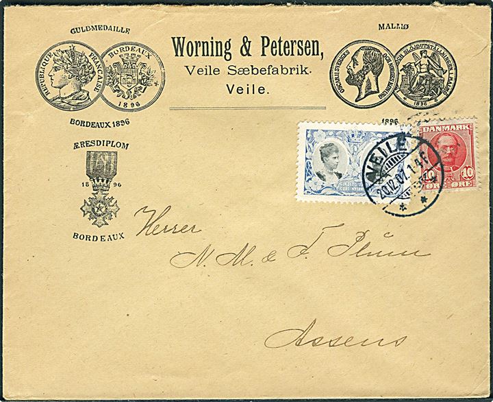 10 øre Fr. VIII og Julemærke 1907 på smuk illustreret firmakuvert fra firma Worning & Petersen i Veile d. 20. 12.1907 til Assens.