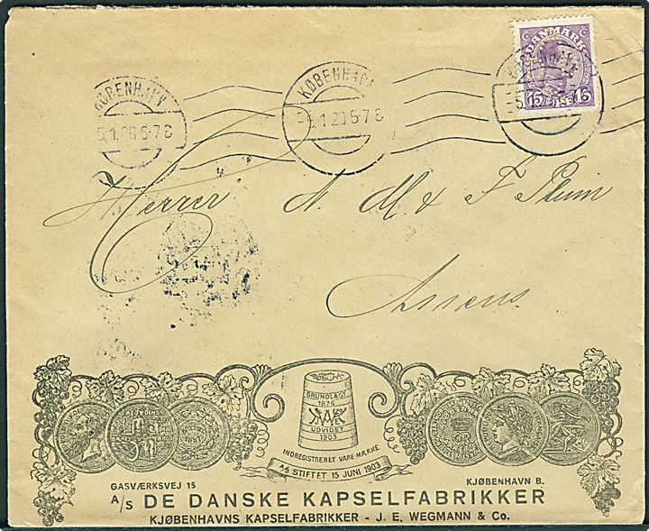 15 øre Chr. X med perfin ADDK på illustreret firma-kuvert fra A/S De danske Kapselfabrikker i Kjøbenhavn d. 5.1.1920 til Assens. 