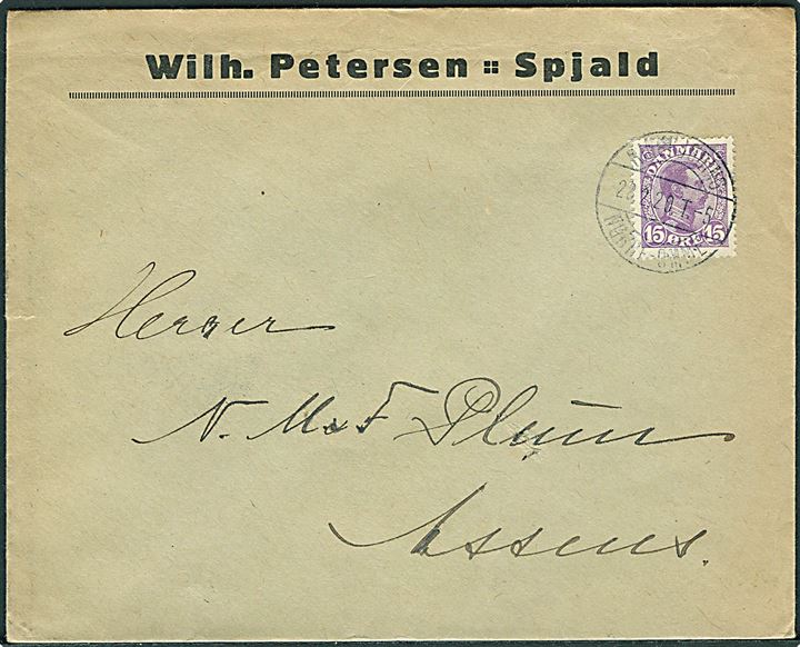 15 øre Chr. X på firmakuvert fra Spjald annulleret med bureaustempel Ringkjøbing - Nørre-Omme T.5 d. 28.2. 1920 til Assens. Anvendt ca. 2 år senere end registreret af Hovard.