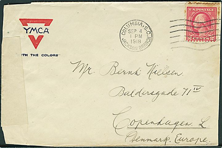 Amerikansk 2 cents Washington på YMCA kuvert stemplet Columbia S.C. Jackson Branch d. 4.9.1918 til København, Danmark. Fra soldat i 1st Bty. 4th Btn. Motor School F.A.R.D., Camp Jackson, Columbia. Åbnet af britisk censur no. 909.
