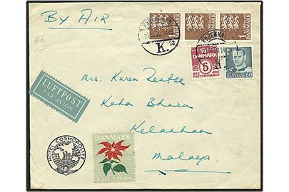 5 øre vinrød bølgelinie og 60 øre blågrøn Fr. IX samt 1 kr. brun rigsvåben på luftpost brev fra København d. 21.11.1950 til Malaya.