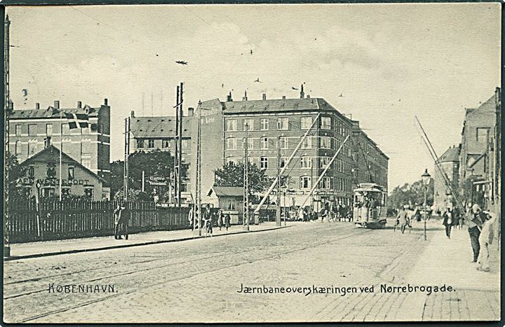 Købh., Nørrebrogade med sporvogn ved jernbaneoverskærringen. Stenders no. 4590. Kvalitet 8