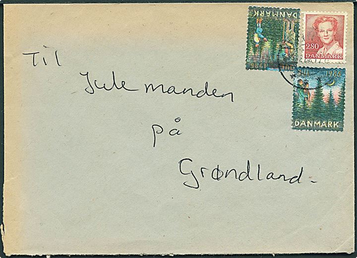 2,80 kr. Margrethe og Julemærke 1986 på brev med svagt stempel fra Fjenneslev 1986 til Julemanden på Grønland.