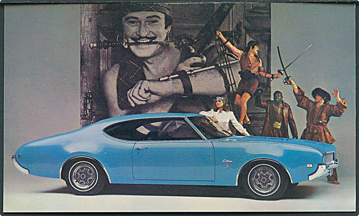 Reklamekort: Ecape from the ordinary in a 1969 Oldsmobile Cutlass S Holiday Coupe. U/no. 
