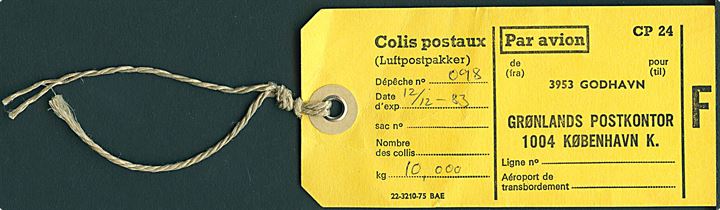 Colis postaux CP 24 manila-mærke 22-3210-75 BAE for luftpostpakke til Godhavn via Grønlands Postkontor i København d. 12.12.1983.