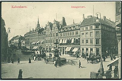 Amagertorv med storkespringvandet i København. C. R. no. 123. Kortet har et knæk.