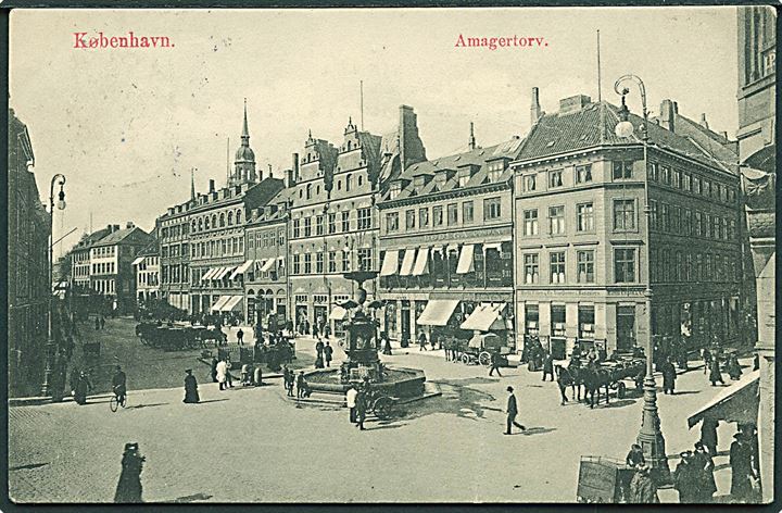 Amagertorv med storkespringvandet i København. C. R. no. 123. Kortet har et knæk.
