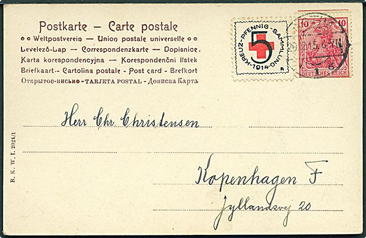 10 pfg. Germania med tydelig automatafskæring og 5 pfg. Røde Kors mærkat på brevkort fra Gotha d. 20.12.1915 til København, Danmark.