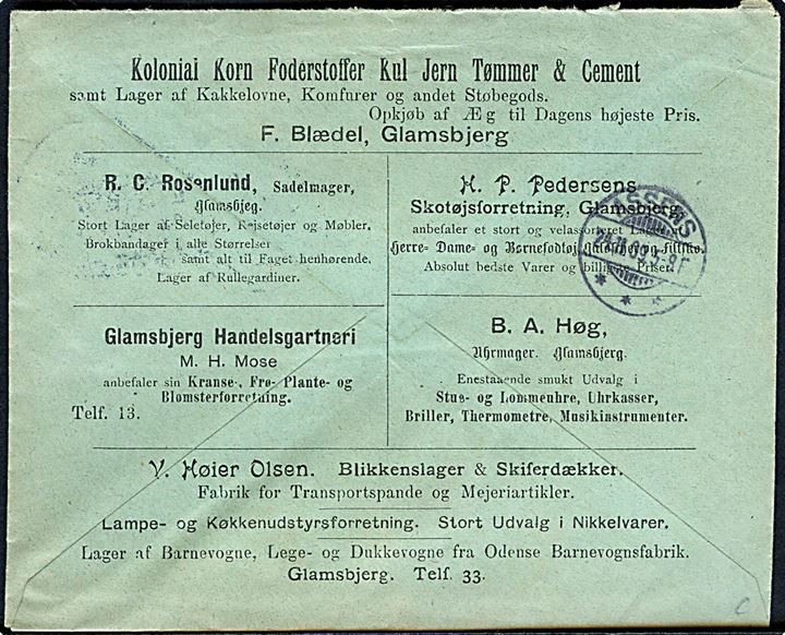 5 øre Fr. VIII og 5 øre Fr. VIII helsagsafklip på fortrykt reklamekuvert fra firma F. Blædel i Glamsbjerg d. 23.11.1909 til Assens. På bagsiden små rubrik-annoncer for en række handelsdrivende i Glamsbjerg.