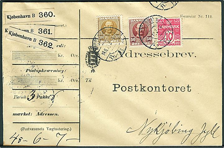 10 øre Bølgelinie, 50 øre og 100 øre Fr. VIII på adressebrev for 3 pakker fra Kjøbenhavn d. 14.11.1913 til Nykjøbing i Jylland.