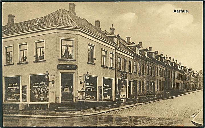 Aarhus, Nørre Allé 78 med Hans Steen’s Kolonial- og Kaffeforretning. Reklamekort. J.J.N. no. 8812. Kvalitet 8