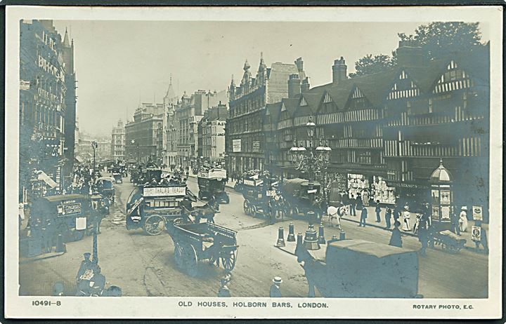 Old Houses, Holborn Bars, London. Mange Omnibusser. Rotary Photo E. C. no. 10491-8. Fotokort. 