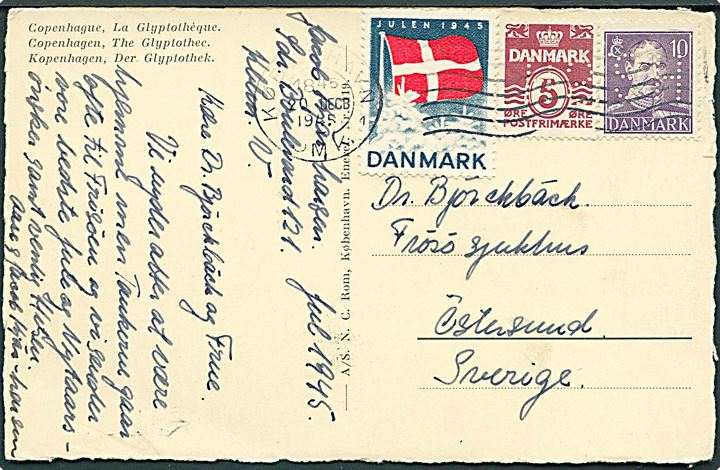 5 øre Bølgelinie og 10 øre Chr. X med perfin SH (Firma Søren Høgh), samt Julemærke 1945 på brevkort fra København d. 20.12.1945 til Östersund, Sverige.