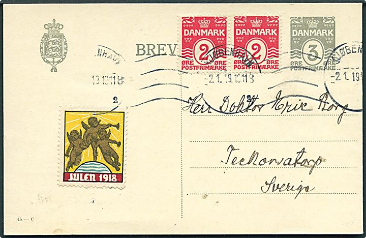 3 øre helsagsbrevkort (fabr. 45-C) opfrankeret med 2 øre Bølgelinie i par og Julemærke 1918 fra Kjøbenhavn d. 2.1.1919 til Teckomatorp, Sverige. Korrekt 7 øre porto til Sverige (1.6.1918-1.7.1919). 
