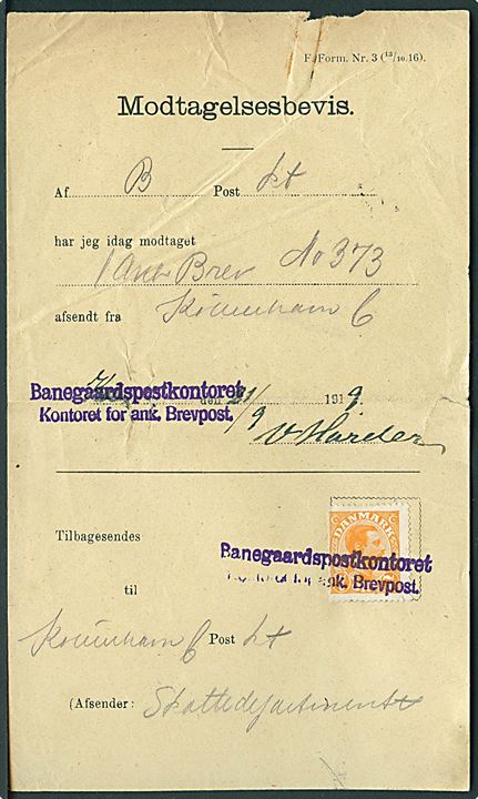 Modtagelsesbevis - F. Form. Nr. 3 (13/10 16) frankeret med 7 øre Chr. X annulleret med violet kontorstempel Banegaardspostkontoret Kontoret for ank. Brevpost d. 21.9.1919 for anbefalet lokalbrev. Mindre rifter.