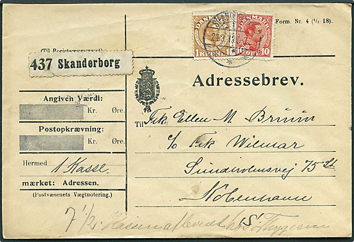10 øre og 1 kr. Chr. X på adressebrev for pakke fra Skanderborg d. 24.3.1919 til København.