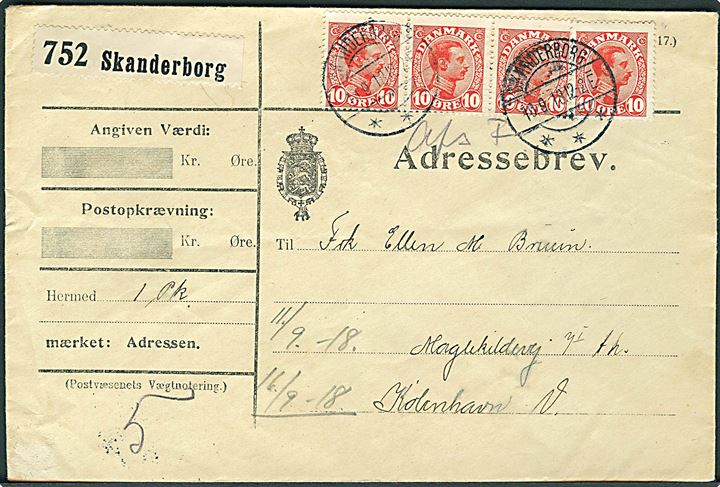 10 øre Chr. X (4) på adressebrev for pakke fra Skanderborg d. 10.9.1918 til København. Påskrevet Afs. F.
