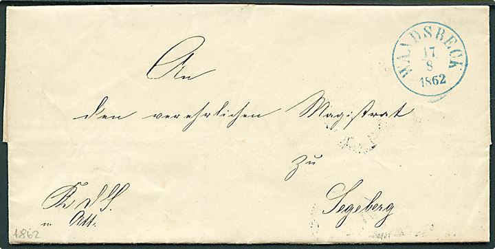 1862. Ufrankeret tjenestebrev mærket K.d.S.m.Att. med blåt antiqua Waldsbeck d. 17.8.1862 til Segeberg.