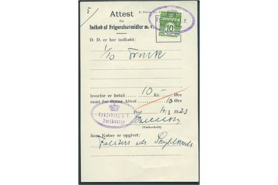 10 øre Bølgelinie (skadet) annulleret med ovalt stempel (krone) Nykjøbing p.F. Postkontor på Attest for Indkøb af FRigørelsesmidler m.v. d. 19.3.1923.