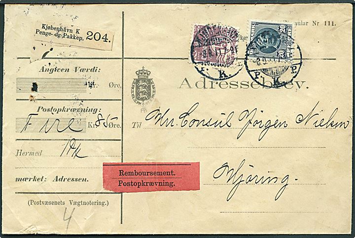 15 øre Bølgelinie og 20 øre Fr. VIII på adressebrev for pakke med opkrævning fra Kjøbenhavn d. 8.9.1911 til Hjørring. Arkivhul.