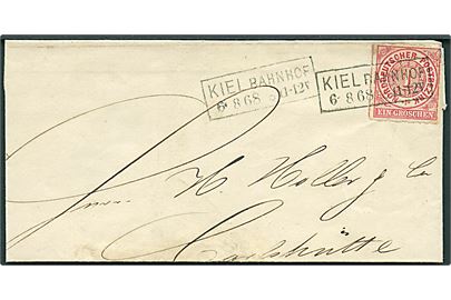 1 gr. stukken kant på brev annulleret med rammestempel Kiel Bahnhof d. 6.8.1868 til Carlshütte pr. Rendsburg. Omfoldet