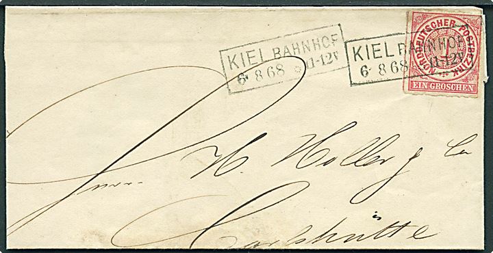 1 gr. stukken kant på brev annulleret med rammestempel Kiel Bahnhof d. 6.8.1868 til Carlshütte pr. Rendsburg. Omfoldet