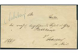 Ufrankeret tjenestebrev med håndskrevet bynavn Ascheberg til Schillsdorf pr. Kiel. Påskrevet Cito. På bagsiden bureaustempel Ascheberg - Kiel d. 27.10.186x.