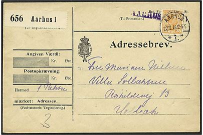 35 øre Chr. X single på adressebrev stemplet AARHUS *1* 22.12.1918 til Holbæk. Violet liniestempel: AARHUS INDL. 1 under frankering, antagelig markering for betalt blanket.