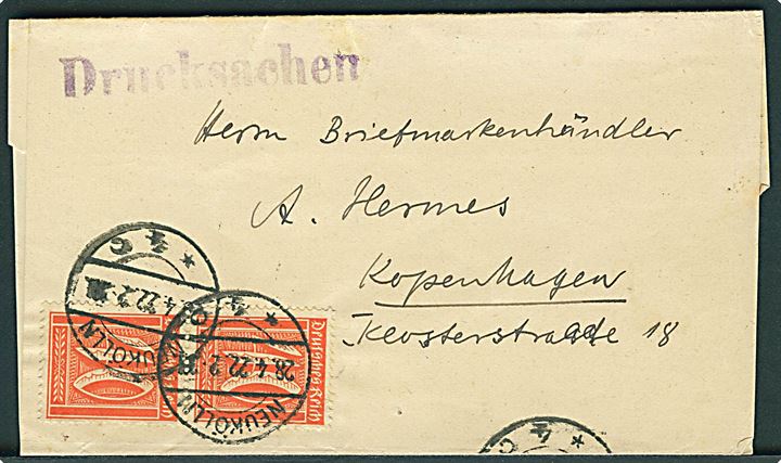 40 pfg. Ciffer i parstykke på infla korsbånd fra Neukölln d. 28.4.1922 til København, Danmark.