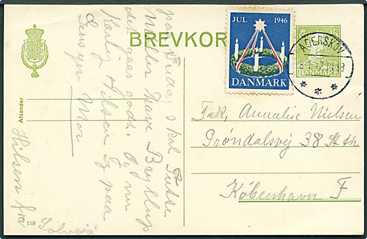 15 øre Chr. X helsagsbrevkort (fabr. 159) med Julemærke 1946 annulleret med brotype IVc Agerskov d. 8.1.1947 til København.