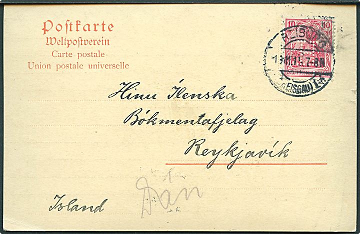 10 pfg. Germania med perdin H på brevkort fra Firma B. Herder i Freiburg d. 19.11.1915 til Reykjavik, Island. Påskrevet Dän hvilke antagelig betyder via Danmark for at undgå den britiske censur. 