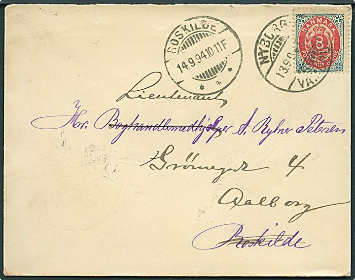 8 øre Tofarvet på brev annulleret med bureaustempel Nyborg - Vamdrup T.85 d. 13.9.1894 til Roskilde - eftersendt til Aalborg.