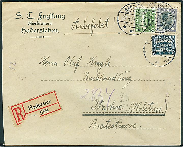 10 øre, 20 øre Genforening og 40 øre Chr. X på anbefalet brev fra Haderslev d. 27.9.1921 til Itzehoe, Tyskland.