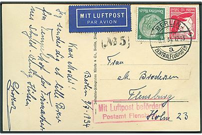 6 pfg. Hindenburg og 10 pfg. Luftpost på indenrigs luftpost brevkort (Berlin Zentralflughafen) stemplet Berlin Zentralflughafen d. 9.7.1934 til Flensburg. Rødt rammestempel Mit Luftpost befördert Postamt Flensburg.