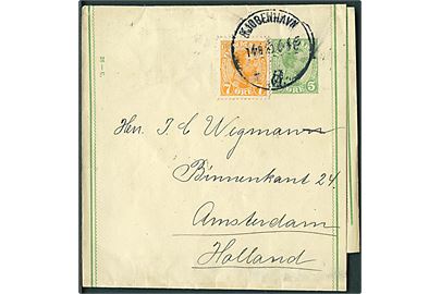 5 øre Chr. X helsagskorsbånd (fabr. 26-C) opfrankeret med 7 øre Chr. X fra Kjøbenhavn d. 14.8.1920 til Amsterdam, Holland.