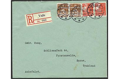 10 øre brun bølgelinie og 15 øre rød karavel på Rec. brev fra Vejle d. 19.9.1932 til Fyrstenwalde, Tyskland.