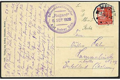15 øre rød karavel på skibspost postkort fra Sandvig d. 6.9.1928 til Tyskland. Salonschelldampfer, Rugard, Auf hoher See skibsstempel.