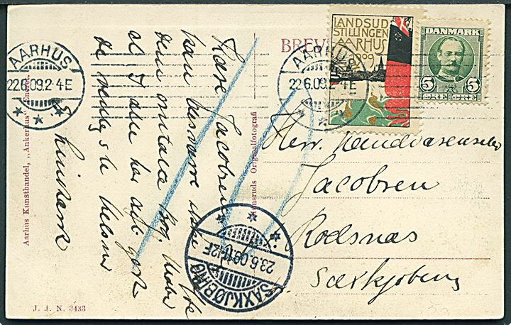 5 øre Fr. VIII og Landsudstillingen 1909 mærkat på brevkort (Landsudstillingen i Aarhus 1909) fra Aarhus d. 22.6.1909 til Saxkjøbing. Udtakseret i 10 øre porto - muligvis pga. den påklæbede mærkat.