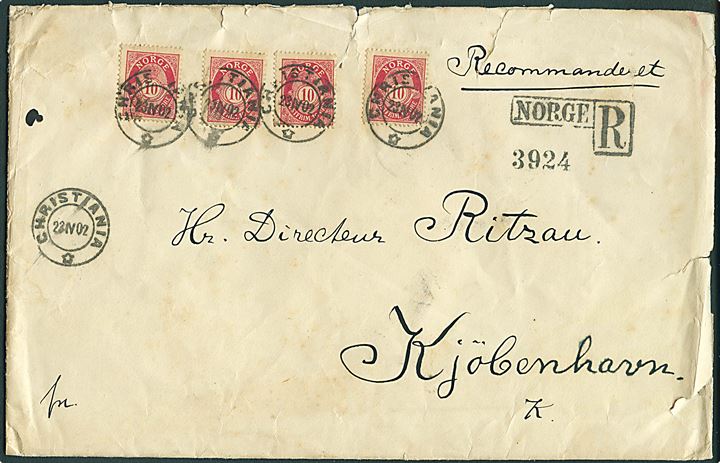 10 øre Posthorn (4) på anbefalet brev fra Christiania d. 23.4.1902 til Kjøbenhavn, Danmark. Rifter.
