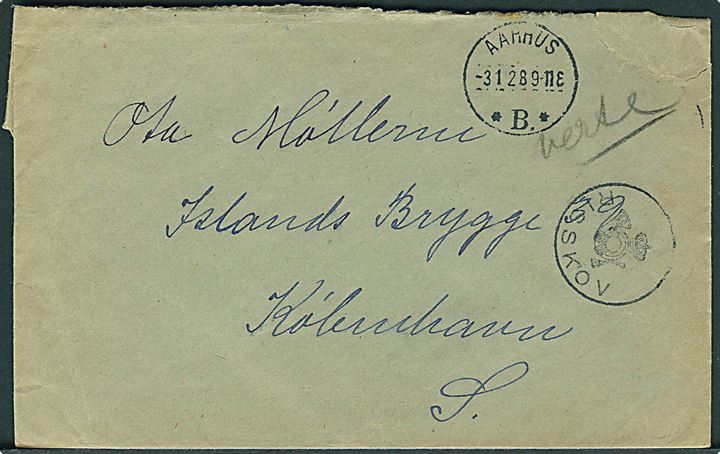 15 øre Karavel på bagsiden af brev stemplet Aarhus *B* d. 3.1.1928 og sidestemplet med posthornstempel RISSKOV til København.
