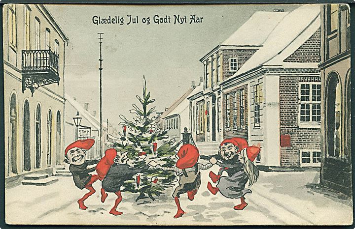 Varde, Storgade. “Glædelig Jul og Godt Nyt Aar” med nisser i bybilledet. N. O. M. Nielsens Boghandel u/no. Kvalitet 7