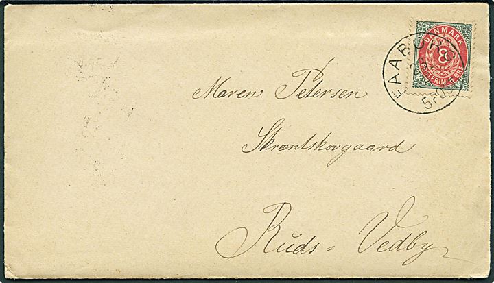 8 øre Tofarvet på brev annulleret med lapidar Faaborg d. 23.4.1890 via Slagelse til Ruds Vedby.