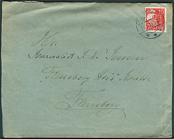 15 øre Karavel single på GRÆNSEPORTO-brev stemplet Rinkenæs sn1 d. 21.1.1930 til Flensburg, Tyskland.