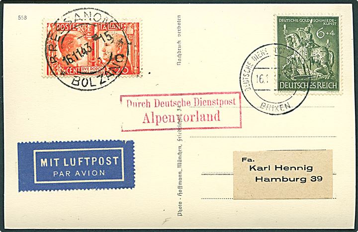 Italien 20 c. Stemplet Bolzano d. 16.11.1943 og tysk 6+4 pfg. stemplet Deutsche Dienstpost Brixen d. 16.11.1943 på brevkort (Adolf Hitler) sendt som luftpost til Hamburg, Tyskland. Rammestempel: Durch Deutsche Dienstpost Aplenvorland.