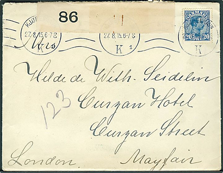 20 øre Chr. X på brev fra Kjøbenhavn d. 27.8.1915 til London, England. Åbnet af britisk censur no. 86.