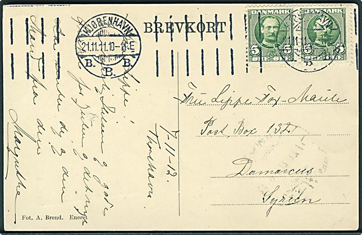 5 øre Fr. VIII i parstykke på brevkort (Kystparti, Færøerne) dateret Thorshavn d. 7.11.1912 (fejl i årstal) sendt som skibspost og annulleret Kjøbenhavn d. 21.11.1911 til Damaskus, Syrien. God destination fra Færøerne.
